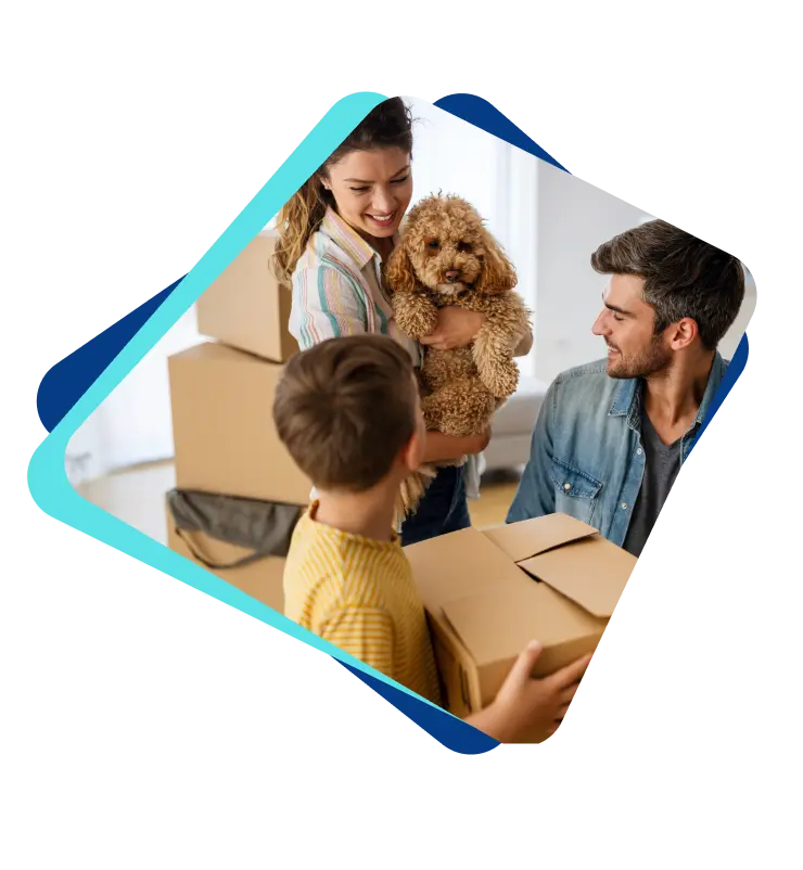 Family with a dog unpacking moving boxes