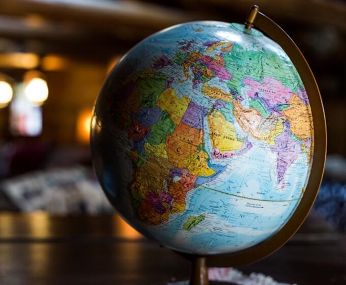 A globe on a desk, for moves in and out of the UK